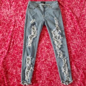 **SOLD** FashionNova distressed jeans